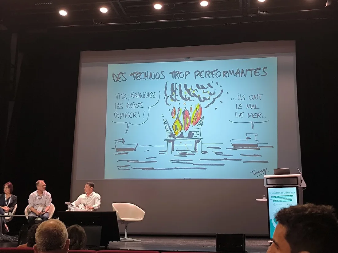 Dessin humoristique de Tommy : « Des technos trop performantes » — robots pompiers et mal de mer